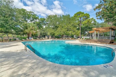 Freshly painted with new LVP and brand-new carpet in June 2023 on Palmetto Dunes Golf Course and Resort in South Carolina - for sale on GolfHomes.com, golf home, golf lot