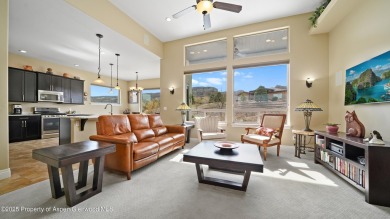 Welcome home to the heart of Redlands Mesa, where breathtaking on The Golf Club At Redlands Mesa in Colorado - for sale on GolfHomes.com, golf home, golf lot