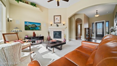 Welcome home to the heart of Redlands Mesa, where breathtaking on The Golf Club At Redlands Mesa in Colorado - for sale on GolfHomes.com, golf home, golf lot