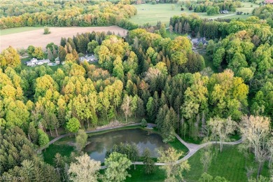 Situated on over 14 acres overlooking the Chagrin River Valley on The Kirtland Country Club in Ohio - for sale on GolfHomes.com, golf home, golf lot