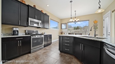 Welcome home to the heart of Redlands Mesa, where breathtaking on The Golf Club At Redlands Mesa in Colorado - for sale on GolfHomes.com, golf home, golf lot