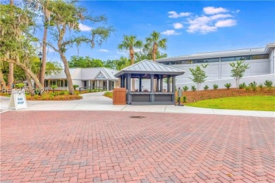 Freshly painted with new LVP and brand-new carpet in June 2023 on Palmetto Dunes Golf Course and Resort in South Carolina - for sale on GolfHomes.com, golf home, golf lot