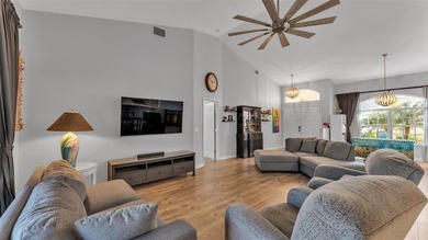 Spend your days under swaying palm trees as you chip, putt and on Huntington Hills Golf and Country Club in Florida - for sale on GolfHomes.com, golf home, golf lot