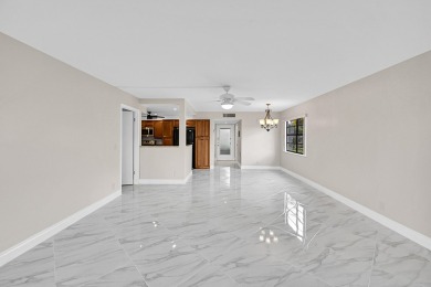 Amazing 2/2 deluxe corner condo with direct lake and golf course on Kings Point Golf -Flanders Way in Florida - for sale on GolfHomes.com, golf home, golf lot