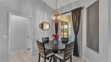 Spend your days under swaying palm trees as you chip, putt and on Huntington Hills Golf and Country Club in Florida - for sale on GolfHomes.com, golf home, golf lot