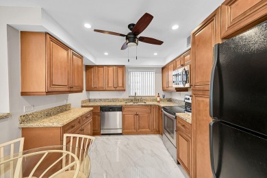 Amazing 2/2 deluxe corner condo with direct lake and golf course on Kings Point Golf -Flanders Way in Florida - for sale on GolfHomes.com, golf home, golf lot