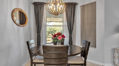 Spend your days under swaying palm trees as you chip, putt and on Huntington Hills Golf and Country Club in Florida - for sale on GolfHomes.com, golf home, golf lot