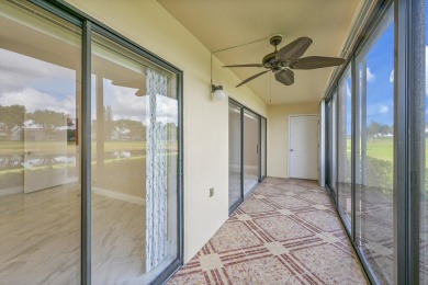 Amazing 2/2 deluxe corner condo with direct lake and golf course on Kings Point Golf -Flanders Way in Florida - for sale on GolfHomes.com, golf home, golf lot