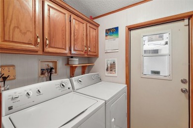 An Affordable Find in a Fantastic Community;This 1990 Palm on Plantation Golf Club in Florida - for sale on GolfHomes.com, golf home, golf lot