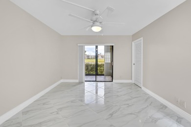 Amazing 2/2 deluxe corner condo with direct lake and golf course on Kings Point Golf -Flanders Way in Florida - for sale on GolfHomes.com, golf home, golf lot