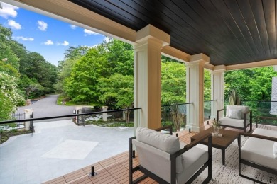 Set at the quiet end of an exclusive cul-de-sac, beyond a secure on Bobby Jones Golf Club in Georgia - for sale on GolfHomes.com, golf home, golf lot