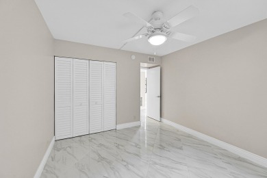 Amazing 2/2 deluxe corner condo with direct lake and golf course on Kings Point Golf -Flanders Way in Florida - for sale on GolfHomes.com, golf home, golf lot