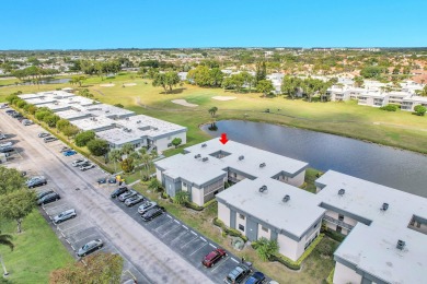 Amazing 2/2 deluxe corner condo with direct lake and golf course on Kings Point Golf -Flanders Way in Florida - for sale on GolfHomes.com, golf home, golf lot