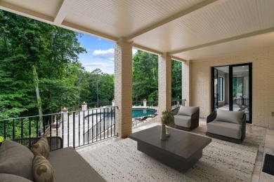 Set at the quiet end of an exclusive cul-de-sac, beyond a secure on Bobby Jones Golf Club in Georgia - for sale on GolfHomes.com, golf home, golf lot