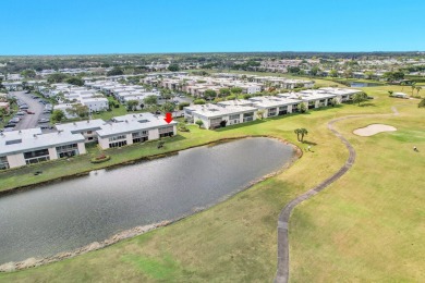 Amazing 2/2 deluxe corner condo with direct lake and golf course on Kings Point Golf -Flanders Way in Florida - for sale on GolfHomes.com, golf home, golf lot