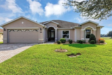 Affordable Low-Maintenance Stucco Home in Guard Gated, Active on Arlington Ridge Golf Club in Florida - for sale on GolfHomes.com, golf home, golf lot