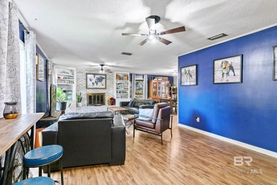 Step inside this spacious 4-bedroom, 2-bath ranch-style home on on Lake Forest Yacht and Country Club in Alabama - for sale on GolfHomes.com, golf home, golf lot