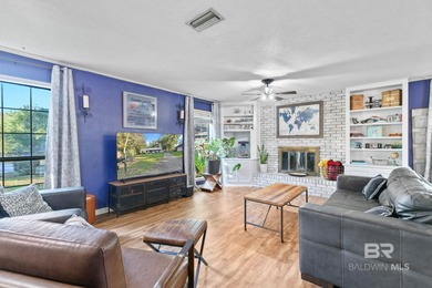 Step inside this spacious 4-bedroom, 2-bath ranch-style home on on Lake Forest Yacht and Country Club in Alabama - for sale on GolfHomes.com, golf home, golf lot