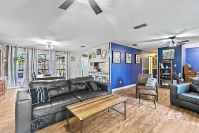 Step inside this spacious 4-bedroom, 2-bath ranch-style home on on Lake Forest Yacht and Country Club in Alabama - for sale on GolfHomes.com, golf home, golf lot