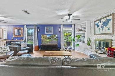 Step inside this spacious 4-bedroom, 2-bath ranch-style home on on Lake Forest Yacht and Country Club in Alabama - for sale on GolfHomes.com, golf home, golf lot