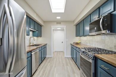 Welcome to 397 Hagen Way, an exceptional luxury villa perfectly on London Bridge Golf Course in Arizona - for sale on GolfHomes.com, golf home, golf lot