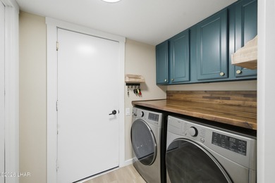 Welcome to 397 Hagen Way, an exceptional luxury villa perfectly on London Bridge Golf Course in Arizona - for sale on GolfHomes.com, golf home, golf lot