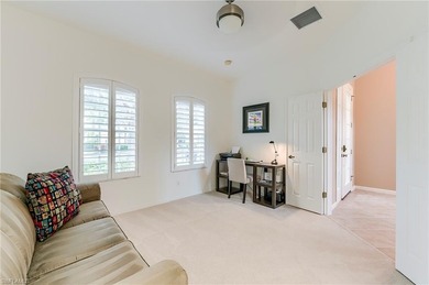 This stunning home features a spacious screened lanai with south on Shadow Wood Country Club in Florida - for sale on GolfHomes.com, golf home, golf lot