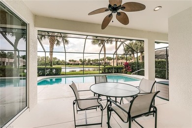 This stunning home features a spacious screened lanai with south on Shadow Wood Country Club in Florida - for sale on GolfHomes.com, golf home, golf lot