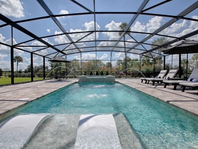 STUNNING 3/2 EXPANDED IRIS DESIGNER with SALT WATER HEATED POOL on Pennbrooke Fairways in Florida - for sale on GolfHomes.com, golf home, golf lot