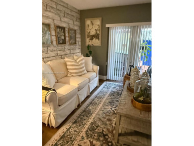 Stunning Remodeled Townhouse in the Heart of Doral! Located on  in Florida - for sale on GolfHomes.com, golf home, golf lot