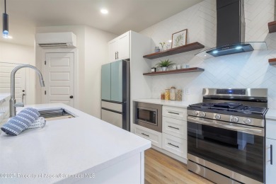 Modern Townhomes for Sale in Grand Junction, CO - Velo Ridge on The Golf Club At Redlands Mesa in Colorado - for sale on GolfHomes.com, golf home, golf lot
