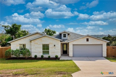 Beautiful stone-adorned home located on a huge lot in the highly on Lago Vista Golf Club in Texas - for sale on GolfHomes.com, golf home, golf lot