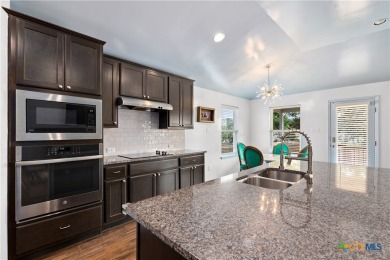 Beautiful stone-adorned home located on a huge lot in the highly on Lago Vista Golf Club in Texas - for sale on GolfHomes.com, golf home, golf lot