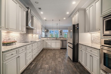 A stunning home situated directly on the Intracoastal Waterway on Myrtlewood Golf Course and Club  in South Carolina - for sale on GolfHomes.com, golf home, golf lot