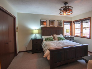 Peaceful and private, this entirely renovated home where no on Crystal Mountain Golf Course in Michigan - for sale on GolfHomes.com, golf home, golf lot