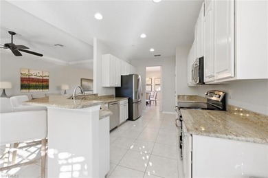 Beautifully Appointed Turnkey Furnished Top-Floor Carriage Home on Naples Lakes Country Club in Florida - for sale on GolfHomes.com, golf home, golf lot