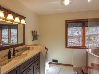 Peaceful and private, this entirely renovated home where no on Crystal Mountain Golf Course in Michigan - for sale on GolfHomes.com, golf home, golf lot