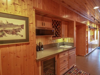 Peaceful and private, this entirely renovated home where no on Crystal Mountain Golf Course in Michigan - for sale on GolfHomes.com, golf home, golf lot