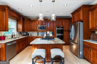 Welcome to 3243 Chipping Wood Drive-an elegant 4-bedroom, 4 on Alpharetta Athletic Club East in Georgia - for sale on GolfHomes.com, golf home, golf lot