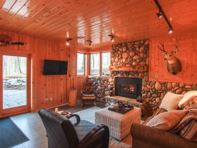 Peaceful and private, this entirely renovated home where no on Crystal Mountain Golf Course in Michigan - for sale on GolfHomes.com, golf home, golf lot