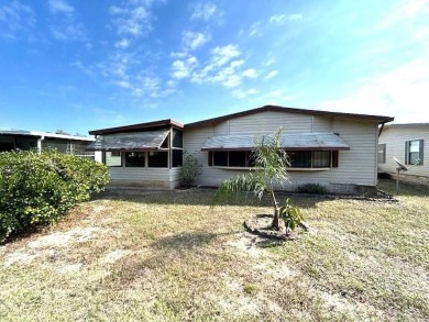 Enjoy stunning golf course views from this spacious 1,464 sq. ft on Crystal Lake Club in Florida - for sale on GolfHomes.com, golf home, golf lot