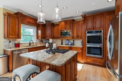 Welcome to 3243 Chipping Wood Drive-an elegant 4-bedroom, 4 on Alpharetta Athletic Club East in Georgia - for sale on GolfHomes.com, golf home, golf lot