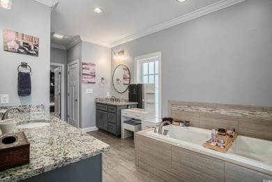 A stunning home situated directly on the Intracoastal Waterway on Myrtlewood Golf Course and Club  in South Carolina - for sale on GolfHomes.com, golf home, golf lot