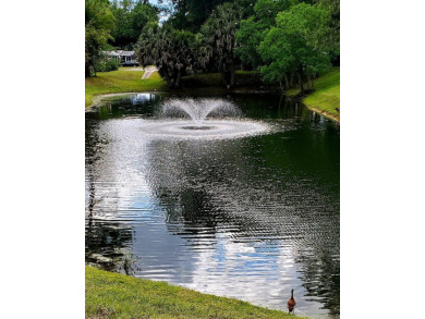 Enjoy your morning coffee or evening libation from the comfort on Rolling Greens Executive Golf Community in Florida - for sale on GolfHomes.com, golf home, golf lot