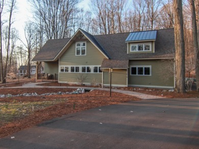 Peaceful and private, this entirely renovated home where no on Crystal Mountain Golf Course in Michigan - for sale on GolfHomes.com, golf home, golf lot