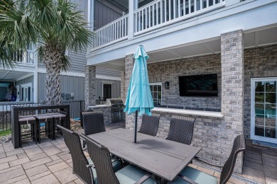 A stunning home situated directly on the Intracoastal Waterway on Myrtlewood Golf Course and Club  in South Carolina - for sale on GolfHomes.com, golf home, golf lot