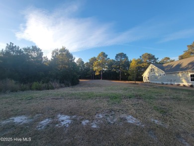 Beautiful home site with only one direct neighbor in the on Sea Trail Golf Resort in North Carolina - for sale on GolfHomes.com, golf home, golf lot
