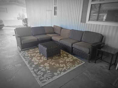 Enjoy your morning coffee or evening libation from the comfort on Rolling Greens Executive Golf Community in Florida - for sale on GolfHomes.com, golf home, golf lot