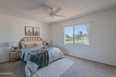 Beautifully maintained end unit condo located in a guard-gated on Scottsdale Shadows in Arizona - for sale on GolfHomes.com, golf home, golf lot