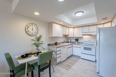 Beautifully maintained end unit condo located in a guard-gated on Scottsdale Shadows in Arizona - for sale on GolfHomes.com, golf home, golf lot